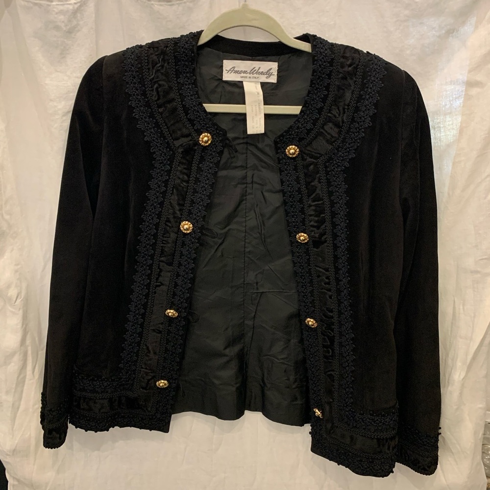 Black velvet jacket with gold buttons, ruffles and lace details

Amen wardy